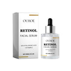 Ouhooe retinol anti aging tightening liquid in clear glass bottle with silver dropper and white box with gold accents
