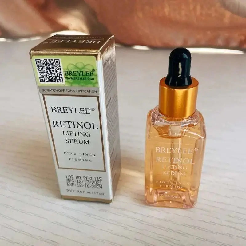 Golden dropper bottle of breylee retinol skin firming serum with amber liquid beside matching box for fine lines
