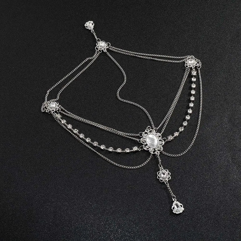 Silver ornate flower drops headpiece with retro diamond embellishments and central oval gemstone detailing