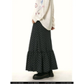 Black and gray checkered tiered maxi fishtail skirt with matching ruffled plaid and ruffled hem for retro style