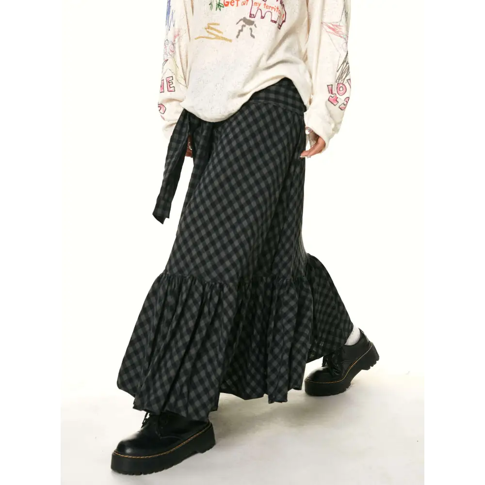 Black and gray checkered fishtail skirt with tiered design and ruffled hem in matching ruffled plaid fabric