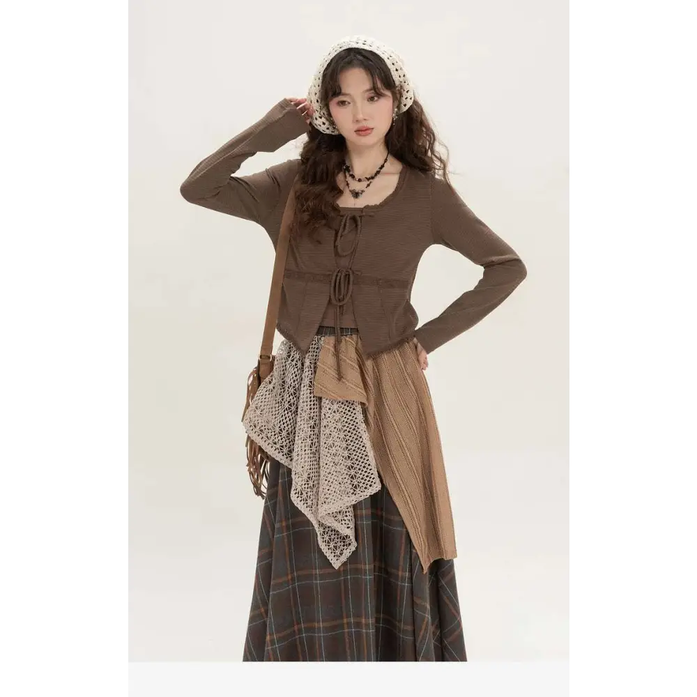 Brown knitted cardigan with tied front and ribbed cuffs styled with a retro minority irregular plaid a line skirt