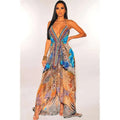 A vibrant floor-length sexy halter dress with retro pattern leopard print and blue floral details in earthy tones