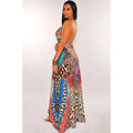Back view of a retro pattern sexy halter dress with leopard print and colorful feather patterns in turquoise red and gold