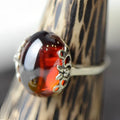 Silver jewelry set featuring a retro red zircon oval gemstone and intricate s925 sterling silver filigree detailing