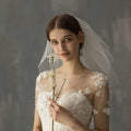 Retro short wedding lace floral veil with delicate white lace gown and sheer beaded wedding bride headdress