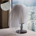 A delicate white lace floral veil with silver comb retro short wedding bride headdress for secure attachment