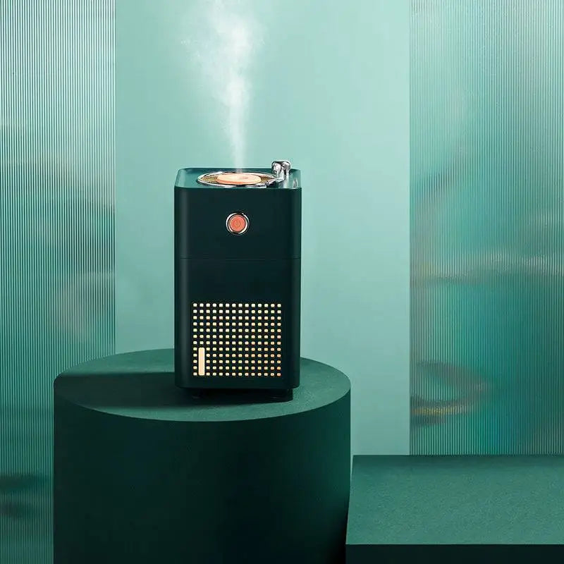 Black rectangular retro vinyl navy blue single spray humidifier with orange button and silver lid emitting mist