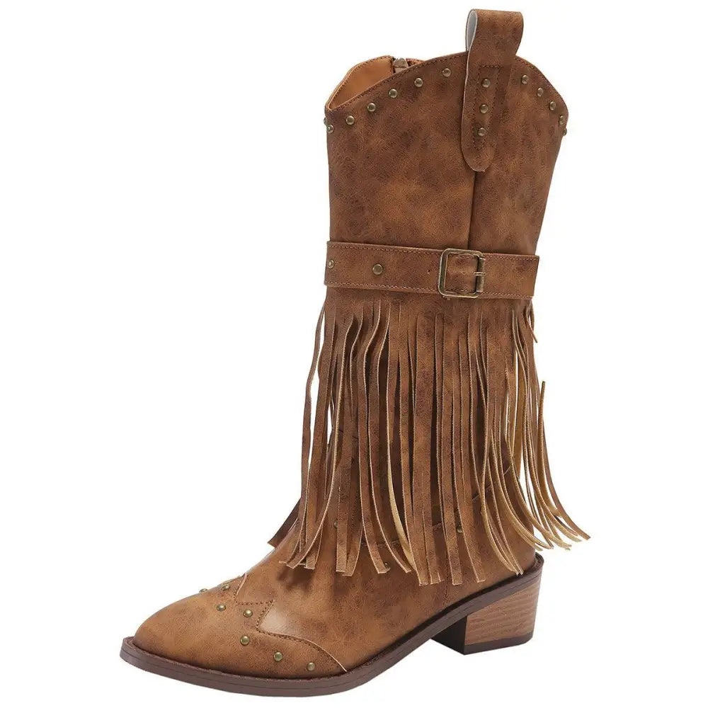 Brown suede cowboy boots with fringe and gold-tone studs reflecting retro winter fashion style
