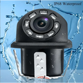 Black dome-style reversing hd waterproof rear view camera with circular lens and surrounding control buttons visible from back side
