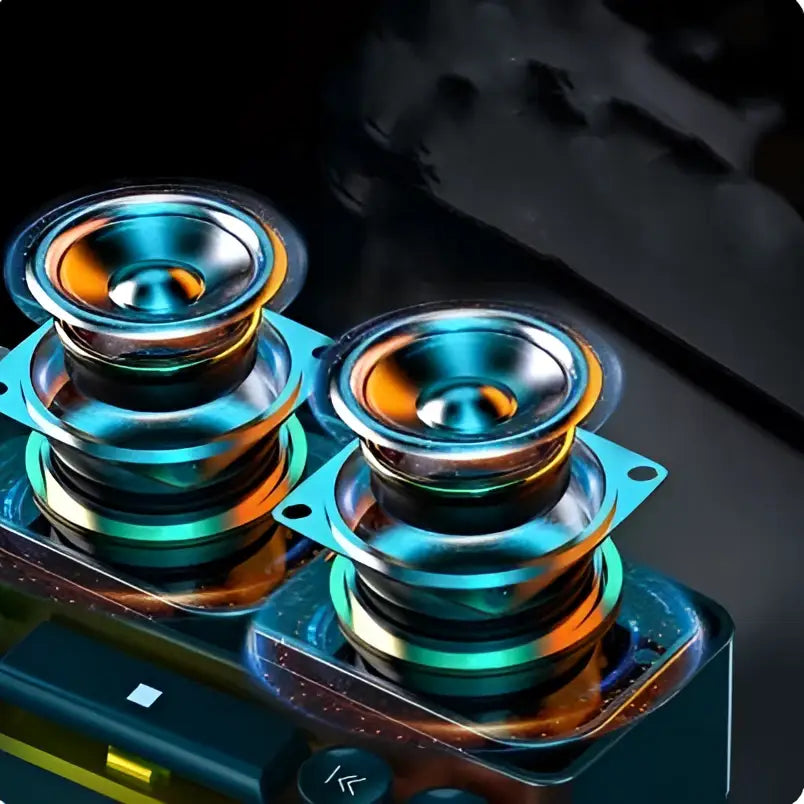 Two sleek metallic wireless bluetooth speakers with vibrant blue and orange iridescent finish for rgb gaming keyboard