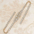 Gold-toned belt buckle with clear faceted crystals in a floral pattern rhinestone applique wedding dress waist jewelry