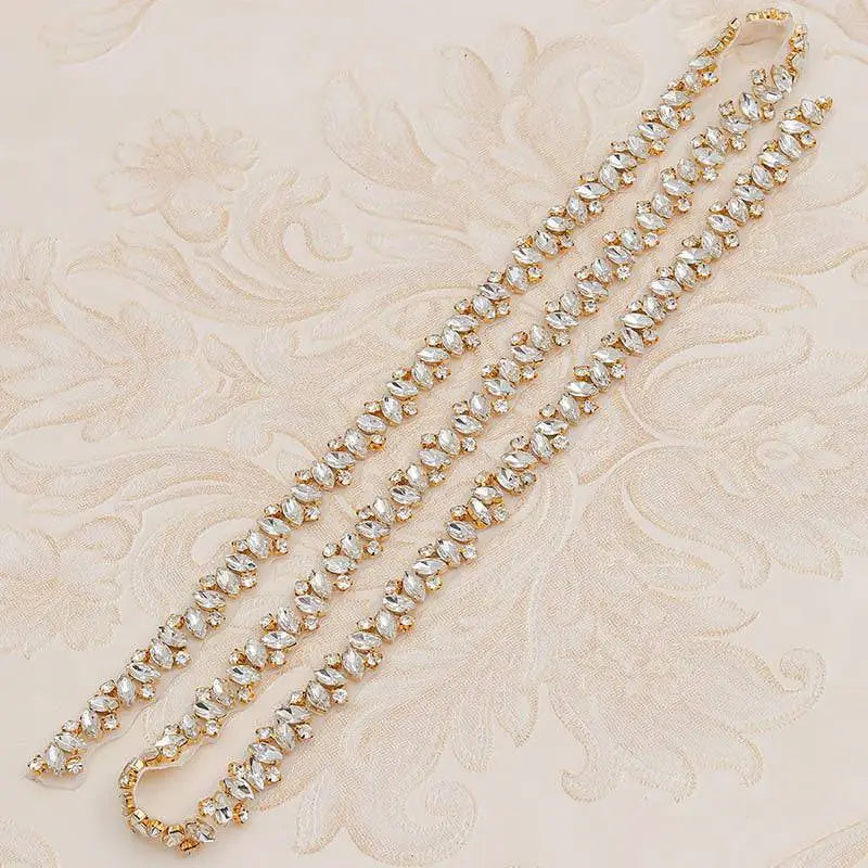 Gold-toned rhinestone applique wedding dress waist jewelry with clear marquise-cut crystals in an elegant continuous pattern