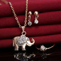 Gold-toned rhinestone elephant necklace with crystal-encrusted back and matching earrings and ring from yiwu small commodity