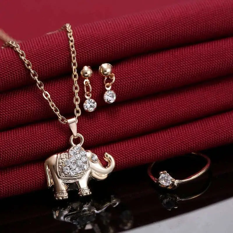 Gold-toned rhinestone elephant necklace with crystal-encrusted body and detailed craftsmanship from yiwu small commodity animal pendants