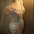 Silver rhinestone feather dress banquet gown bodysuit with intricate chain and crystal detailing