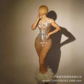 A silver rhinestone feather dress banquet gown featuring a shimmering form-fitting design with a fluffy white feather hem
