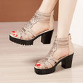 Beige rhinestone fish mouth platform sandals with black chunky heel and intricate cutout detailing
