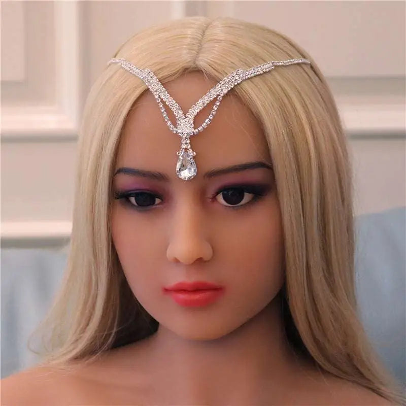A sparkling silver rhinestone headdress featuring a teardrop-shaped crystal drop bridal chain for bridal wear