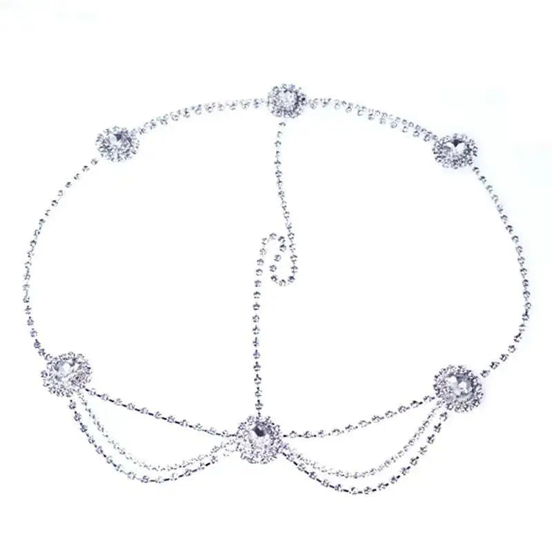 Silver rhinestone headdress featuring a drop bridal chain design with decorative floral clusters for bridal wear