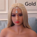 Gold-colored rhinestone headdress with sparkling crystals and a dangling teardrop gem drop bridal chain for bridal use