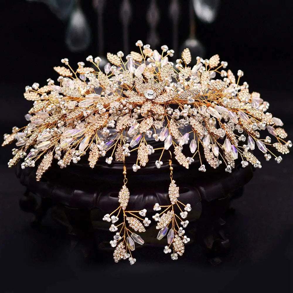 A delicate gold-toned rhinestone leaf handmade headband bridal accessory with crystals pearls and intricate leaf designs