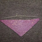 A shimmering purple rhinestone metal flash mesh face mask with triangular design and delicate silver chain detailing