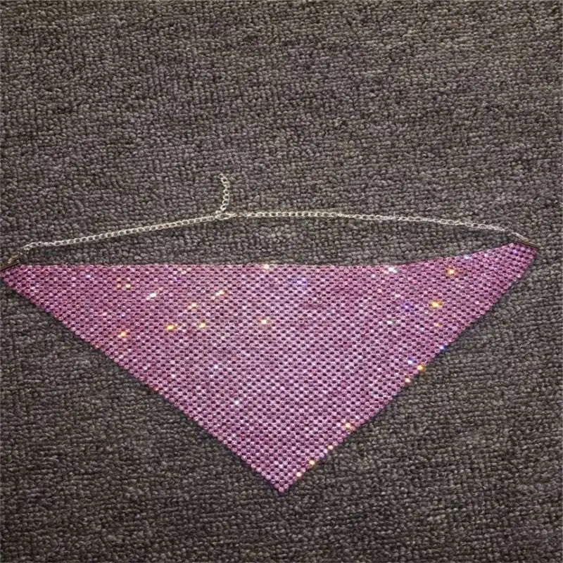 A shimmering purple rhinestone metal flash mesh face mask with triangular design and delicate silver chain detailing
