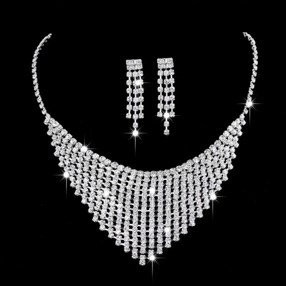 A dazzling silver rhinestone zircon water drop necklace with cascading tiers and matching drop earrings set