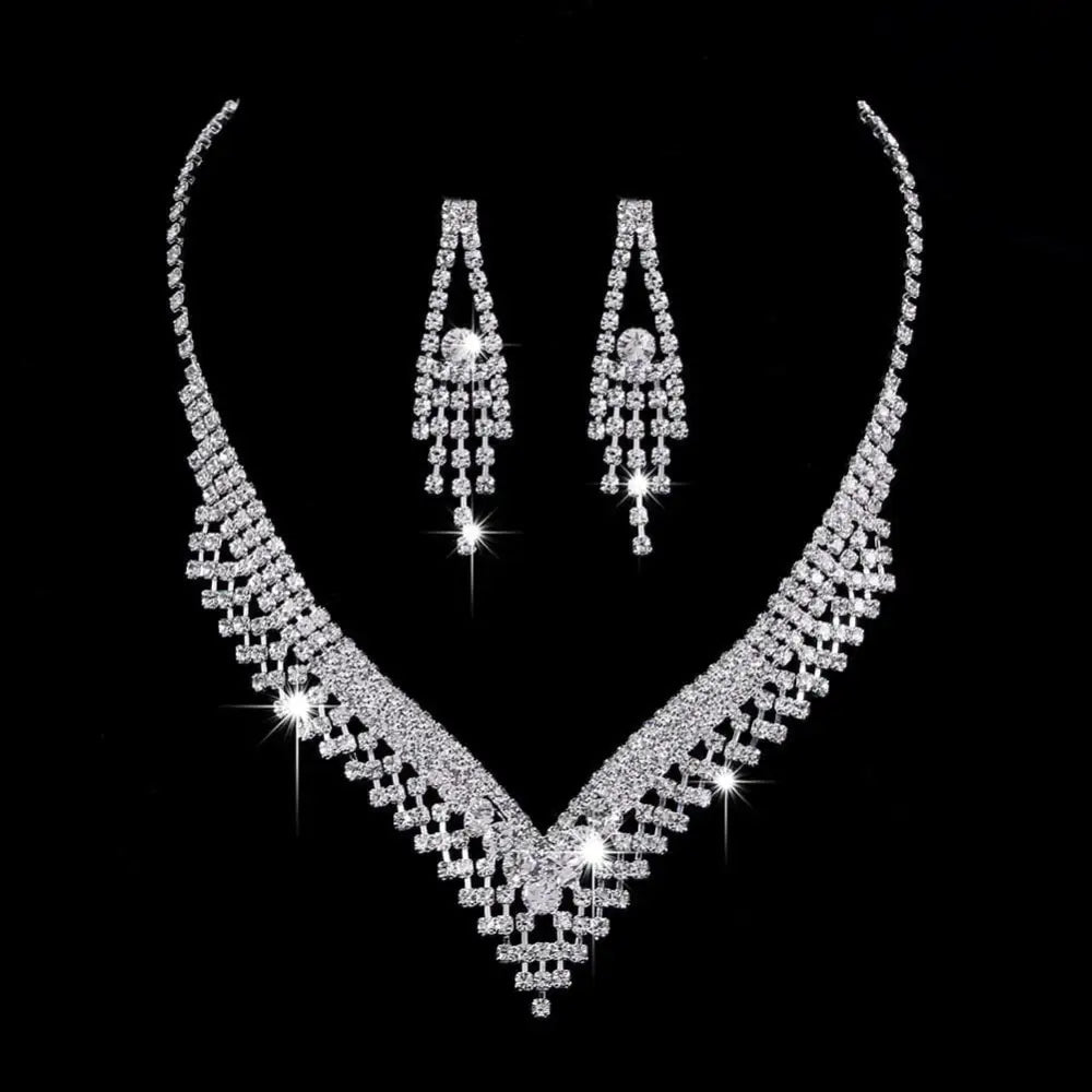 Silver rhinestone zircon water drop necklace and matching drop earrings set with v-shaped cascading crystals