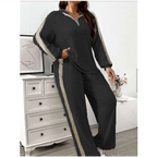 Black ribbed knit striped two-piece loungewear set with beige ribbed knit and gray side panels wide leg pants