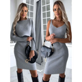 Gray ribbed knit sleeveless top and tight suspender skirt paired with black knee-high boots for skirt fashion autumn look