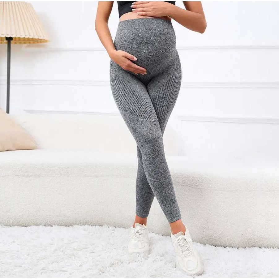 Gray ribbed maternity leggings with high waist belly support designed for comfort and flexible fit during pregnancy