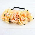 Delicate floral rose headband from rose color package with soft peach cream roses and blue floral rose accents
