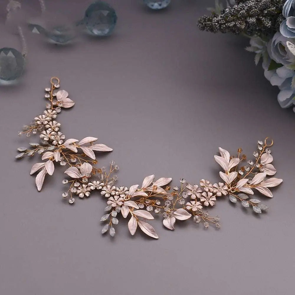 Delicate rose gold floral hair accessories featuring alloy crystals Japan with pale pink enamel leaves and crystal flowers