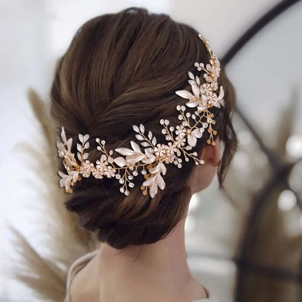 A delicate rose gold floral hair accessory with alloy crystals japan featuring lace-like leaves and sparkling crystals