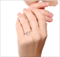 Rose gold beaded sterling silver ring with central round diamond halo setting and intricate sterling silver design