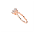Rose gold beaded sterling silver ring with a faceted clear round gemstone and ornate textured silver ring band