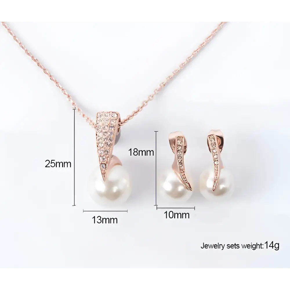Rose gold bridal pearl necklace earrings set with pearl and crystal pendant featuring a sleek claw design
