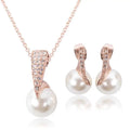 Rose gold bridal pearl necklace with a large white pearl and triangular clear crystal setting for elegant wear