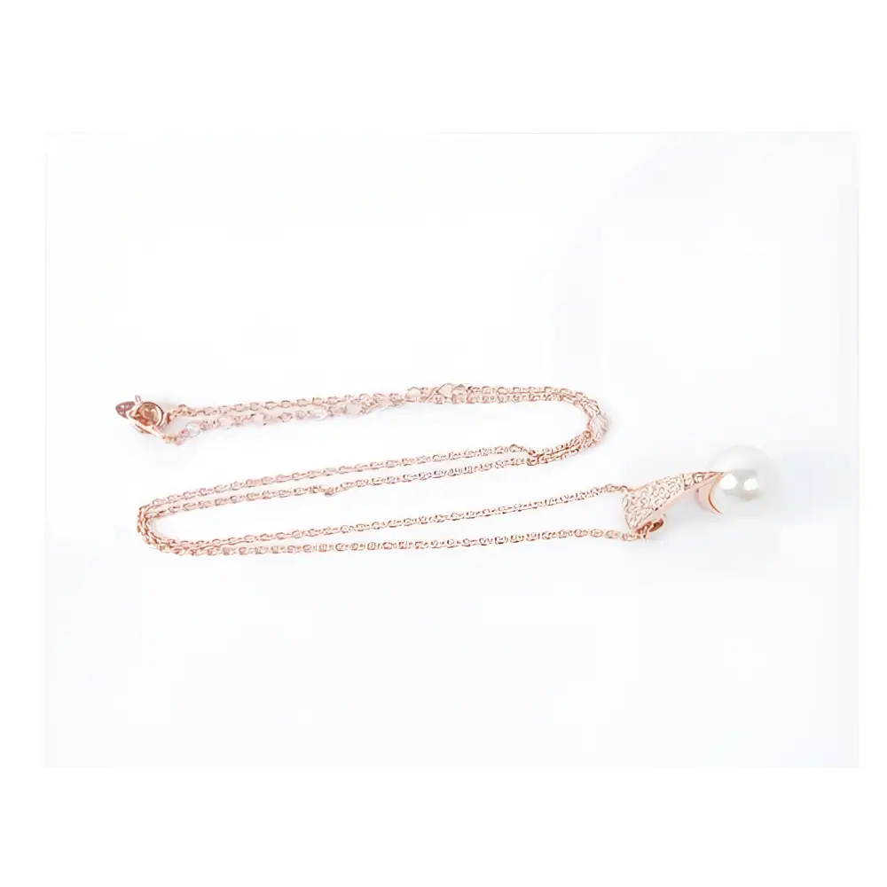 Rose gold bridal pearl necklace with crescent moon pendant featuring sparkling crystals and a single white pearl