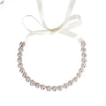 Rose gold bridal rhinestone sunflower hair band with clear crystals and white satin ribbon for wedding wear