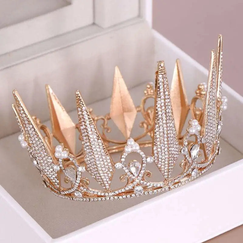 A sparkling rose gold crystal big crown wedding headdress with intricate crystal embellishments and pearl accents