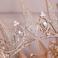 A rose gold crystal big crown wedding headdress with sparkling clear rhinestones and pearl accents for brides