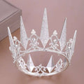 A sparkling silver crystal big crown wedding headdress with intricate crystal spikes and delicate pearl accents