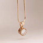 Rose gold crystal pendant necklace with a clear faceted crystal in an ornate beaded setting classic jewelry sets