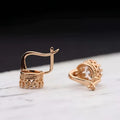 Rose gold crystal hoop earrings with intricate lace detailing and central clear gemstone from classic jewelry sets