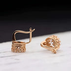 Rose gold crystal hoop earrings with intricate lace detailing and central clear gemstone from classic jewelry sets