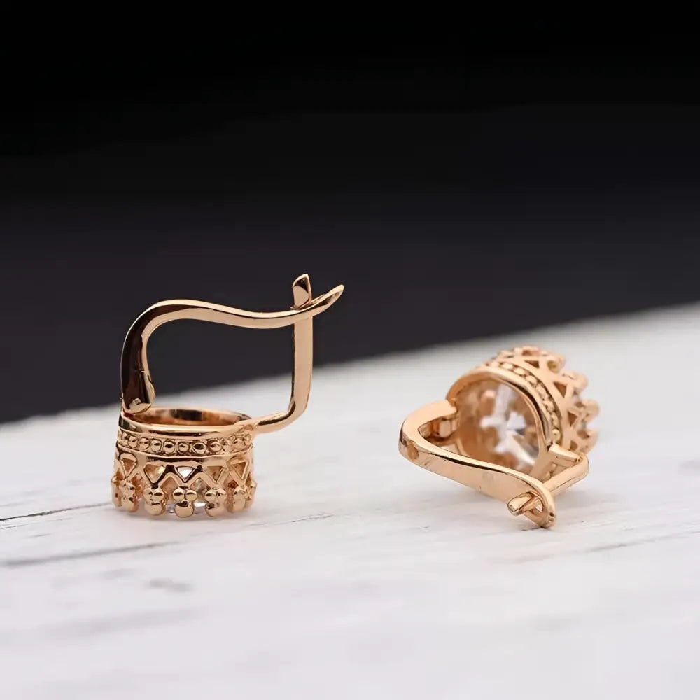 Rose gold crystal hoop earrings with intricate lace detailing and central clear gemstone from classic jewelry sets