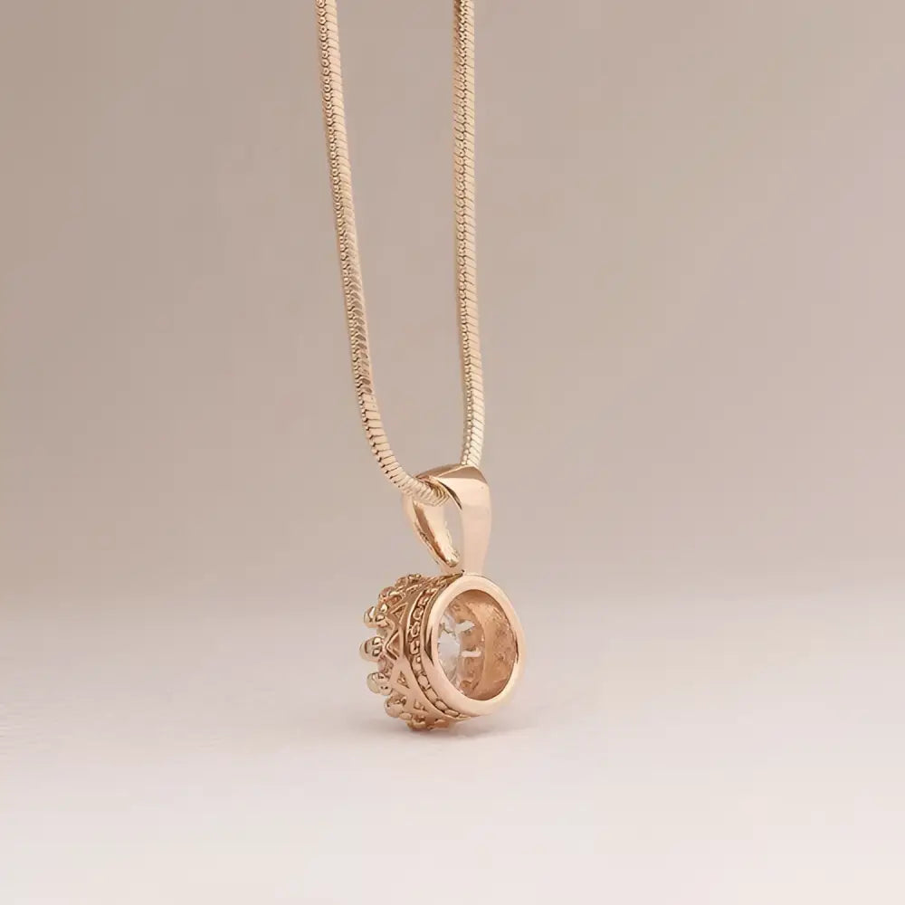 Rose gold crystal classic jewelry sets featuring a necklace with round pendant and matching stud earrings with clear stones